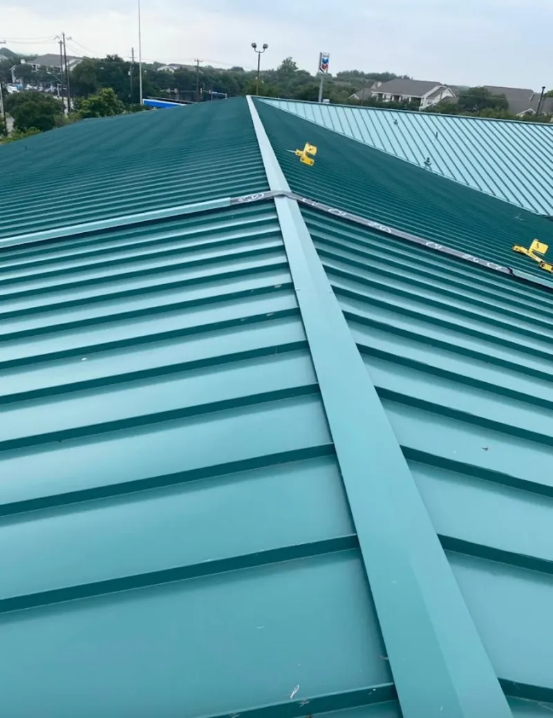 Green commercial metal roof ridge and valley for Metal Roof Repair in Grayson Valley