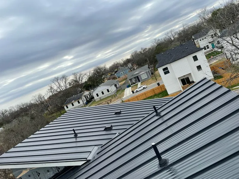 Standing seam metal roof panels with vents for Skylight Repair in Grayson Valley